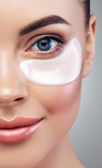 Woman's face with under-eye patch