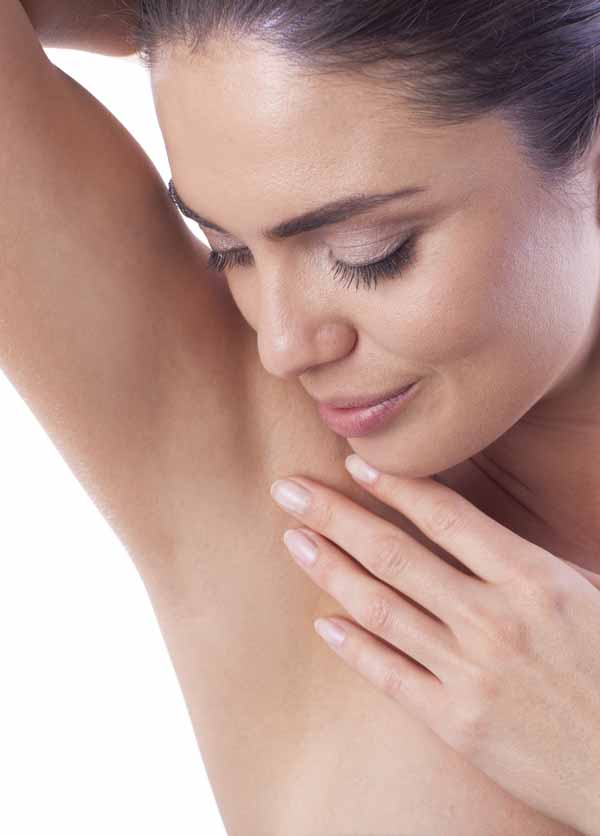 Close up of woman showing her armpit. Beautiful Young asian Woman touching her clean face with fresh Healthy Skin, isolated on white background